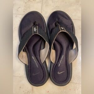 Womens Nike black flip flops, size 8.5